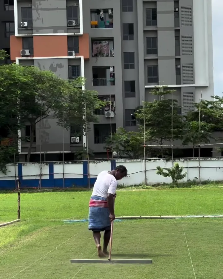 Marking the crease on the HHS turf wicket