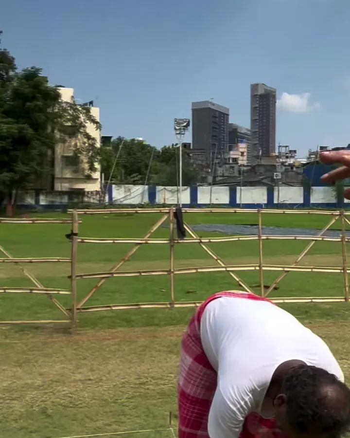 Wide view of the ground and practice nets in daylight