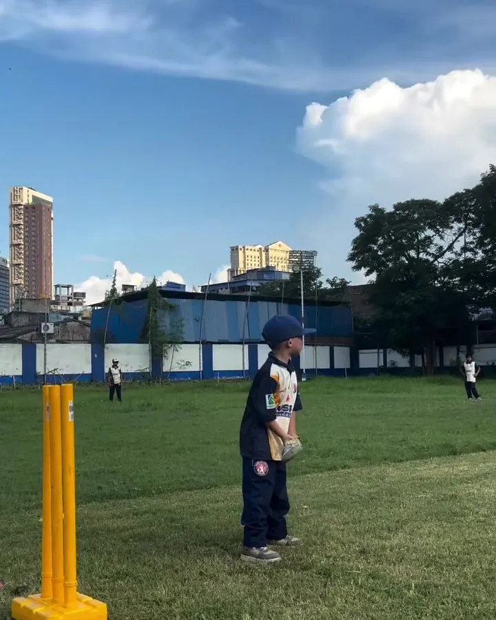 Junior group drill with coaches on the outfield